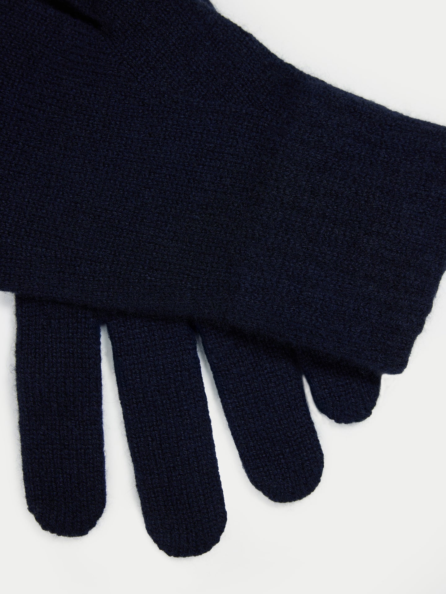 Black gloves on a white background