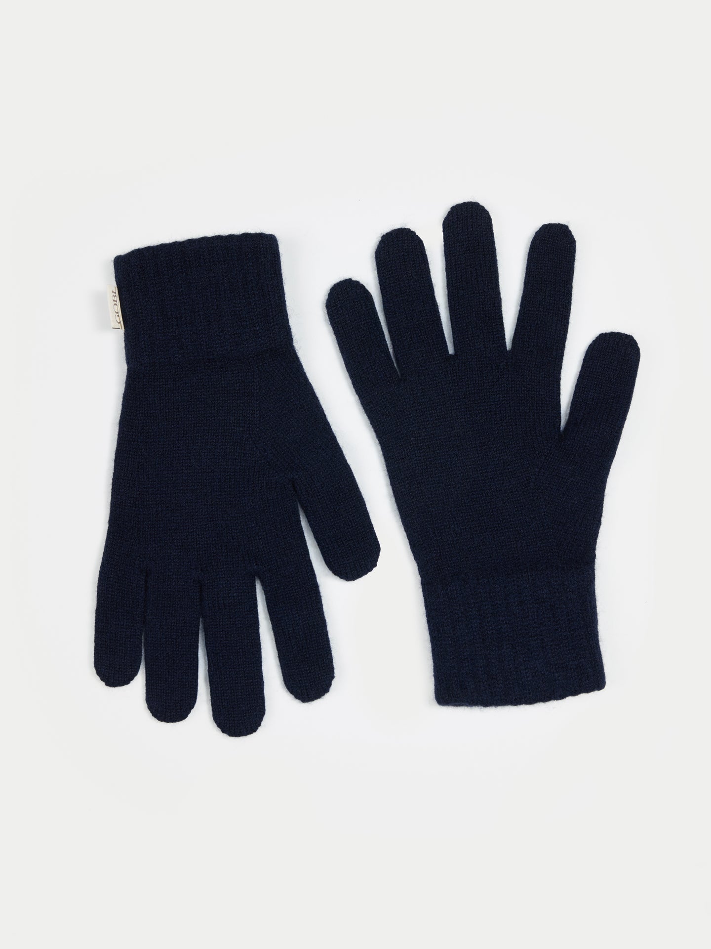 Pair of black gloves on a white background